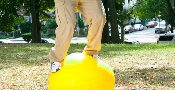 Some people work out on Swiss balls. Meet the guy who stands on them—for hours