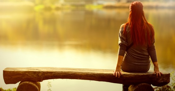 Woman Thinking by Lake